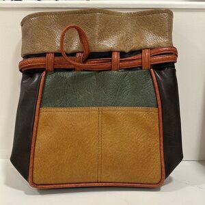 Colour block satchel. Drawstring closure. Tag: “Carolina made”